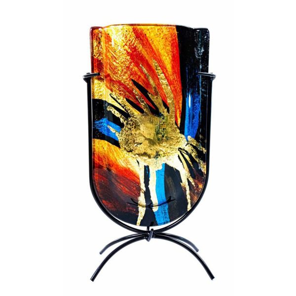 The face of the vase, showing the gold splatter central, with yellow, orange, and reds, coming out of center with blues on a black setting. The colors are almost astronomical.