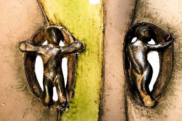 A macro image of the two figures which adorn the interior of the bowl itself - Adam & Eve - a small, hidden little feature of this unique bowl.