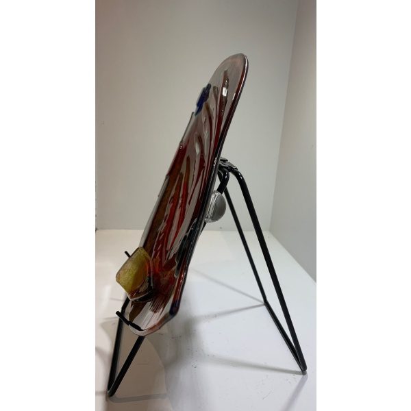 Side profile revealing the stand in more detail.