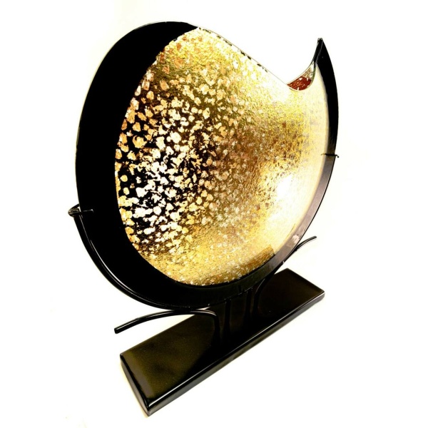 A view of the piece rotated roughly thirty degrees counter-clockwise. The shape has a beauty to its lines at virtually any angle.